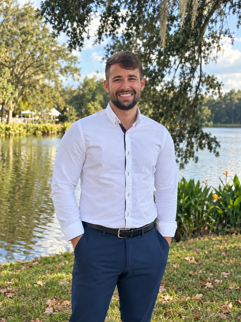 José Molina, founder of JayLM Studio, standing beside a lake